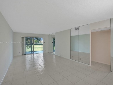 Just reduced. Pristine second floor condo in the gated community on Wynmoor Golf Course in Florida - for sale on GolfHomes.com, golf home, golf lot