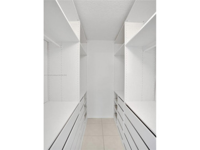 Just reduced. Pristine second floor condo in the gated community on Wynmoor Golf Course in Florida - for sale on GolfHomes.com, golf home, golf lot