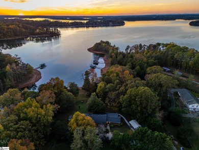 Lakeside Charm & Endless Possibilities on Lake Hartwell! Nestled on Stone Creek Cove Golf Course in South Carolina - for sale on GolfHomes.com, golf home, golf lot