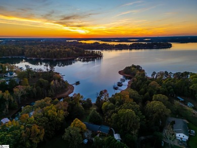 Lakeside Charm & Endless Possibilities on Lake Hartwell! Nestled on Stone Creek Cove Golf Course in South Carolina - for sale on GolfHomes.com, golf home, golf lot