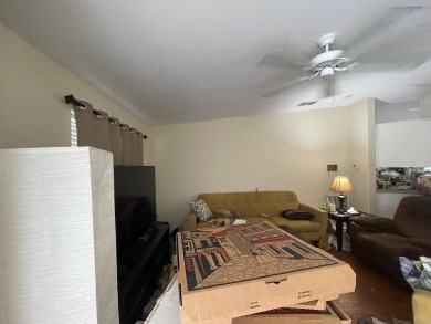 Great opportunity! Sold as is, cash only. Handyman special needs on Savanna Golf Club in Florida - for sale on GolfHomes.com, golf home, golf lot