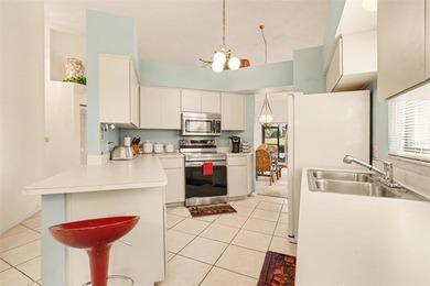 A golfer's dream villa in mint condition, perfectly situated on on Seven Springs Golf and Country Club in Florida - for sale on GolfHomes.com, golf home, golf lot