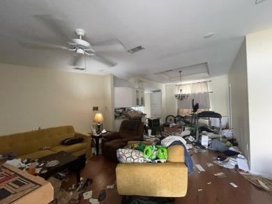 Great opportunity! Sold as is, cash only. Handyman special needs on Savanna Golf Club in Florida - for sale on GolfHomes.com, golf home, golf lot