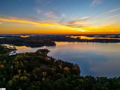 Lakeside Charm & Endless Possibilities on Lake Hartwell! Nestled on Stone Creek Cove Golf Course in South Carolina - for sale on GolfHomes.com, golf home, golf lot