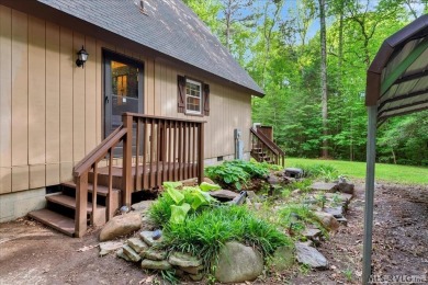 Cute A-frame tucked in the woods at the end of a cul-de-sac on Tanglewood Shores Golf Club in Virginia - for sale on GolfHomes.com, golf home, golf lot