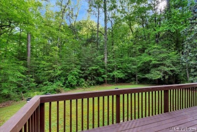 Cute A-frame tucked in the woods at the end of a cul-de-sac on Tanglewood Shores Golf Club in Virginia - for sale on GolfHomes.com, golf home, golf lot