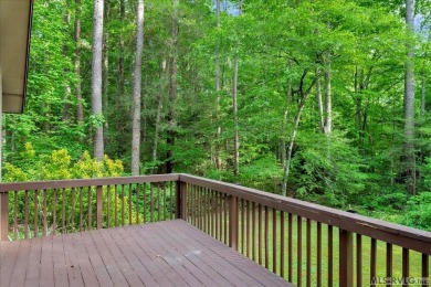 Cute A-frame tucked in the woods at the end of a cul-de-sac on Tanglewood Shores Golf Club in Virginia - for sale on GolfHomes.com, golf home, golf lot