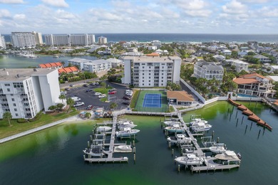 Beautifully maintained 2-bedroom, 2-bath waterfront condo on Sandpiper Cove Golf Course in Florida - for sale on GolfHomes.com, golf home, golf lot