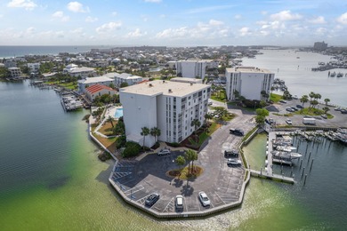 Beautifully maintained 2-bedroom, 2-bath waterfront condo on Sandpiper Cove Golf Course in Florida - for sale on GolfHomes.com, golf home, golf lot