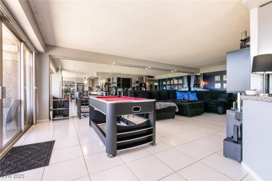 Experience elevated living in this 9th-floor high-rise unit on Las Vegas Country Club in Nevada - for sale on GolfHomes.com, golf home, golf lot