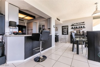 Experience elevated living in this 9th-floor high-rise unit on Las Vegas Country Club in Nevada - for sale on GolfHomes.com, golf home, golf lot