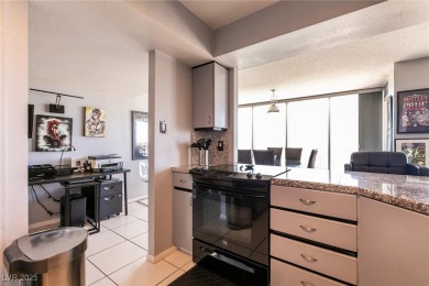 Experience elevated living in this 9th-floor high-rise unit on Las Vegas Country Club in Nevada - for sale on GolfHomes.com, golf home, golf lot