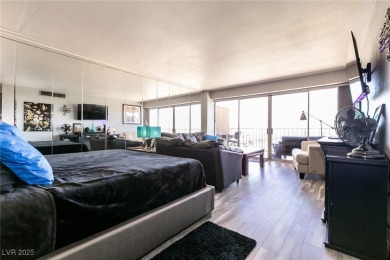 Experience elevated living in this 9th-floor high-rise unit on Las Vegas Country Club in Nevada - for sale on GolfHomes.com, golf home, golf lot