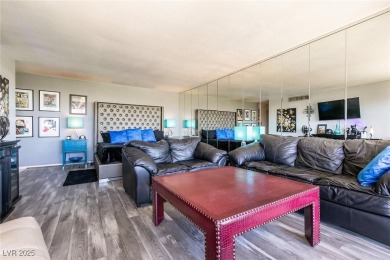 Experience elevated living in this 9th-floor high-rise unit on Las Vegas Country Club in Nevada - for sale on GolfHomes.com, golf home, golf lot