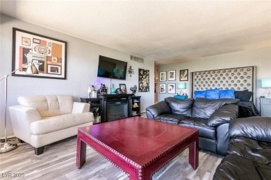 Experience elevated living in this 9th-floor high-rise unit on Las Vegas Country Club in Nevada - for sale on GolfHomes.com, golf home, golf lot