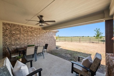 Escape to this well maintained residence nestled in a stunning on The Retreat in Texas - for sale on GolfHomes.com, golf home, golf lot