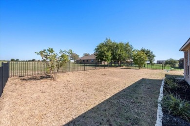 Escape to this well maintained residence nestled in a stunning on The Retreat in Texas - for sale on GolfHomes.com, golf home, golf lot