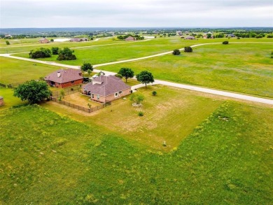 Escape to this well maintained residence nestled in a stunning on The Retreat in Texas - for sale on GolfHomes.com, golf home, golf lot