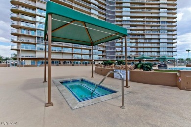 Experience elevated living in this 9th-floor high-rise unit on Las Vegas Country Club in Nevada - for sale on GolfHomes.com, golf home, golf lot
