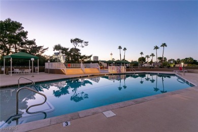 Experience elevated living in this 9th-floor high-rise unit on Las Vegas Country Club in Nevada - for sale on GolfHomes.com, golf home, golf lot