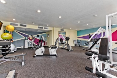 Experience elevated living in this 9th-floor high-rise unit on Las Vegas Country Club in Nevada - for sale on GolfHomes.com, golf home, golf lot
