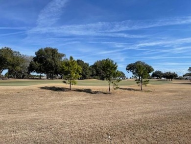 Duplex with golf course home site. Wide open views of the 3rd on On Top of the World Golf Course in Florida - for sale on GolfHomes.com, golf home, golf lot