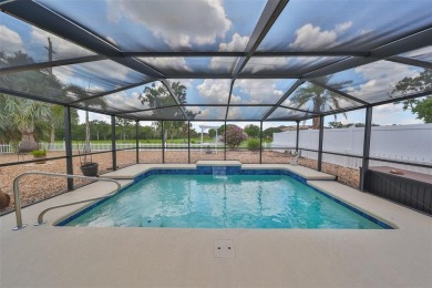 Neat POOL HOME (salt water) with a waterfall overlooking Freedom on North Lakes Golf Course in Florida - for sale on GolfHomes.com, golf home, golf lot
