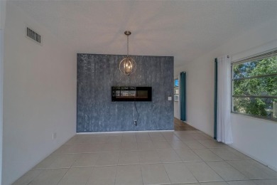 Light, bright and impeccably updated! This 3rd floor corner unit on On Top Of The World Golf Course in Florida - for sale on GolfHomes.com, golf home, golf lot