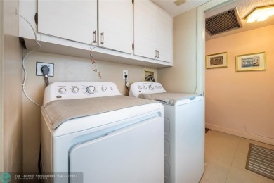 THIS 3 BEDROOM/ 2.5 BATH UNIT OFFERS COMFORTABLE LIVING AT A on Palm-Aire Country Club and Resort - Palms in Florida - for sale on GolfHomes.com, golf home, golf lot