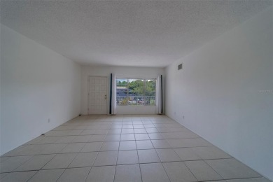 Light, bright and impeccably updated! This 3rd floor corner unit on On Top Of The World Golf Course in Florida - for sale on GolfHomes.com, golf home, golf lot