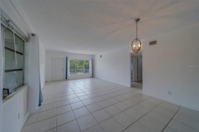 Light, bright and impeccably updated! This 3rd floor corner unit on On Top Of The World Golf Course in Florida - for sale on GolfHomes.com, golf home, golf lot