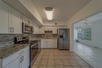 Light, bright and impeccably updated! This 3rd floor corner unit on On Top Of The World Golf Course in Florida - for sale on GolfHomes.com, golf home, golf lot