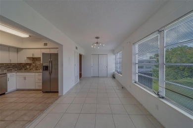 Light, bright and impeccably updated! This 3rd floor corner unit on On Top Of The World Golf Course in Florida - for sale on GolfHomes.com, golf home, golf lot