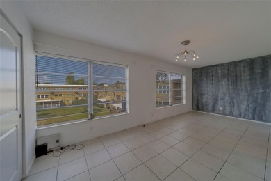Light, bright and impeccably updated! This 3rd floor corner unit on On Top Of The World Golf Course in Florida - for sale on GolfHomes.com, golf home, golf lot