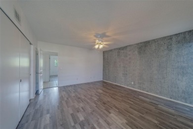 Light, bright and impeccably updated! This 3rd floor corner unit on On Top Of The World Golf Course in Florida - for sale on GolfHomes.com, golf home, golf lot