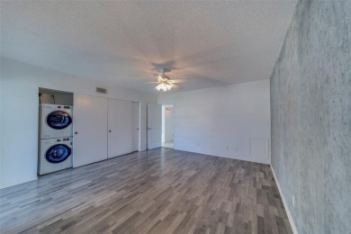 Light, bright and impeccably updated! This 3rd floor corner unit on On Top Of The World Golf Course in Florida - for sale on GolfHomes.com, golf home, golf lot