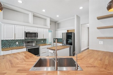 One or more photo(s) has been virtually staged. Located in the on Pebble Creek Golf Club in Florida - for sale on GolfHomes.com, golf home, golf lot