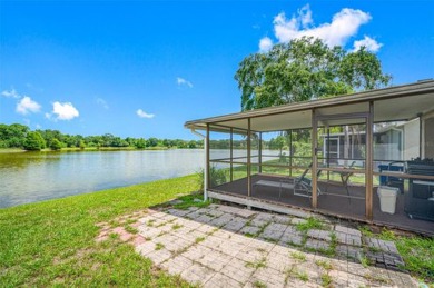 Welcome to your relaxing waterfront retreat! This 3 bedroom 2 on Countryway Golf Course in Florida - for sale on GolfHomes.com, golf home, golf lot