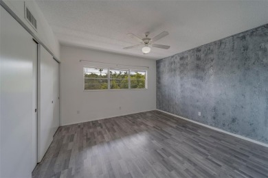 Light, bright and impeccably updated! This 3rd floor corner unit on On Top Of The World Golf Course in Florida - for sale on GolfHomes.com, golf home, golf lot