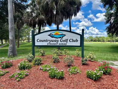 Welcome to your relaxing waterfront retreat! This 3 bedroom 2 on Countryway Golf Course in Florida - for sale on GolfHomes.com, golf home, golf lot