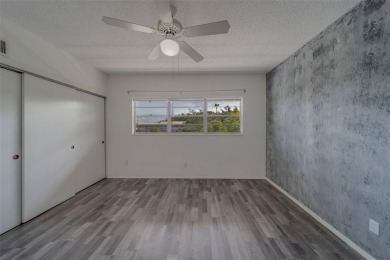 Light, bright and impeccably updated! This 3rd floor corner unit on On Top Of The World Golf Course in Florida - for sale on GolfHomes.com, golf home, golf lot