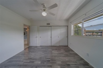 Light, bright and impeccably updated! This 3rd floor corner unit on On Top Of The World Golf Course in Florida - for sale on GolfHomes.com, golf home, golf lot