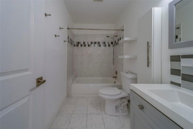 Light, bright and impeccably updated! This 3rd floor corner unit on On Top Of The World Golf Course in Florida - for sale on GolfHomes.com, golf home, golf lot