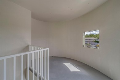 Light, bright and impeccably updated! This 3rd floor corner unit on On Top Of The World Golf Course in Florida - for sale on GolfHomes.com, golf home, golf lot