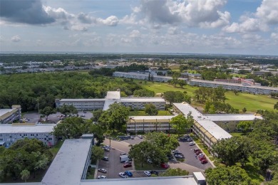 Light, bright and impeccably updated! This 3rd floor corner unit on On Top Of The World Golf Course in Florida - for sale on GolfHomes.com, golf home, golf lot