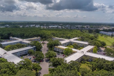 Light, bright and impeccably updated! This 3rd floor corner unit on On Top Of The World Golf Course in Florida - for sale on GolfHomes.com, golf home, golf lot
