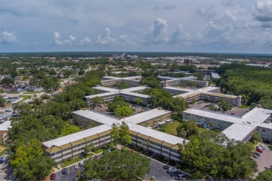 Light, bright and impeccably updated! This 3rd floor corner unit on On Top Of The World Golf Course in Florida - for sale on GolfHomes.com, golf home, golf lot