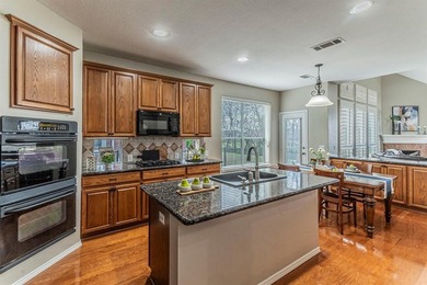 Golf course living meets flexible family space in this on The Trails of Frisco Golf Club in Texas - for sale on GolfHomes.com, golf home, golf lot