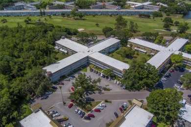 Light, bright and impeccably updated! This 3rd floor corner unit on On Top Of The World Golf Course in Florida - for sale on GolfHomes.com, golf home, golf lot
