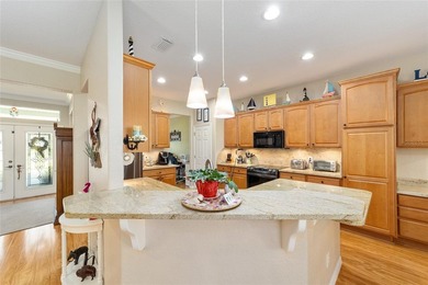 The perfect Hanover 3 Bedroom 2 bath Golf course home is just on Eagle Ridge At Spruce Creek Country Club in Florida - for sale on GolfHomes.com, golf home, golf lot